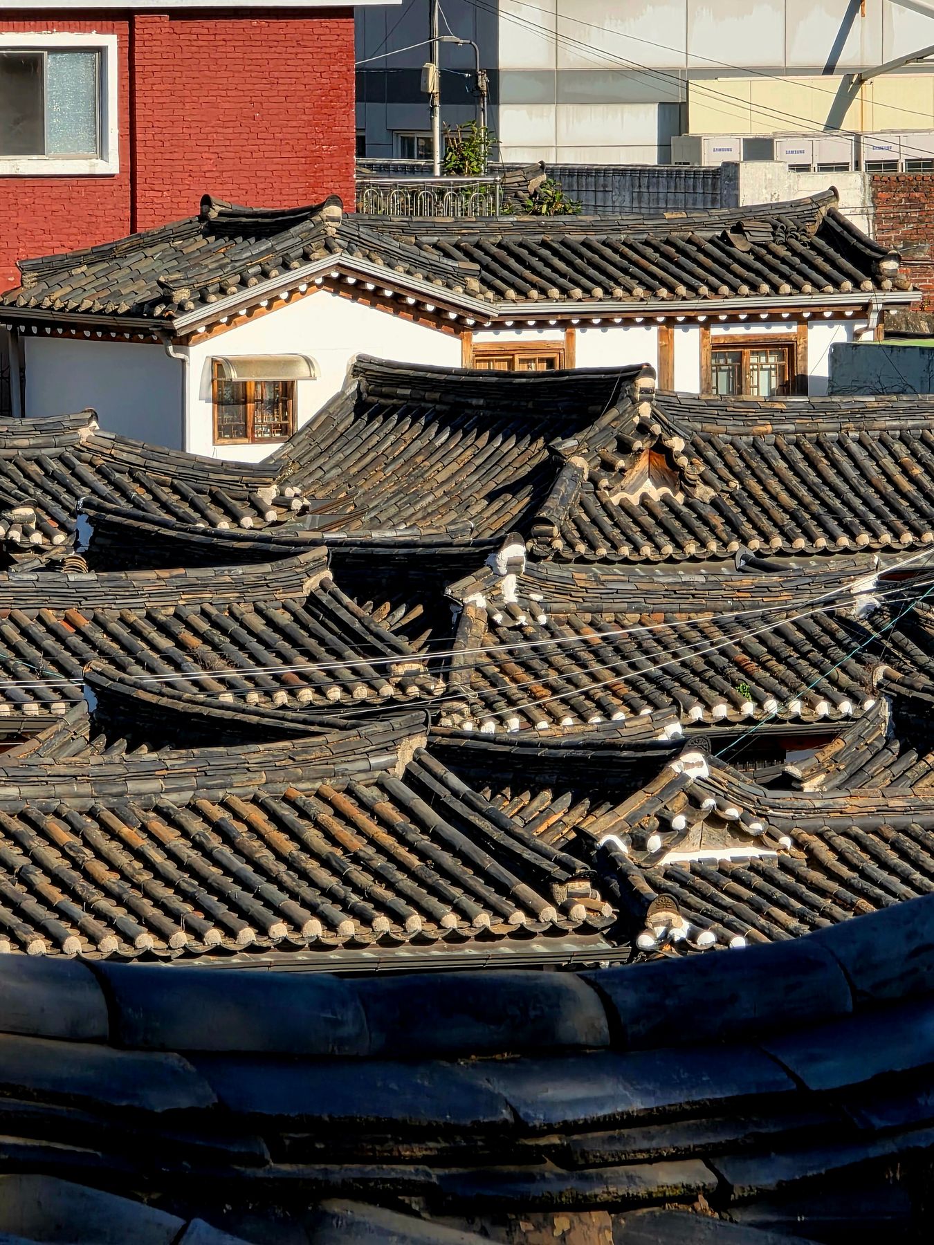 Aerial view of traditional hanok roof tiles in Bukchon Hanok Village, Seoul
