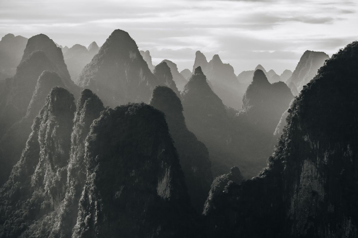 Misty karst mountains in Guilin, Guangxi, illustrating the region's humid, rainy climate
