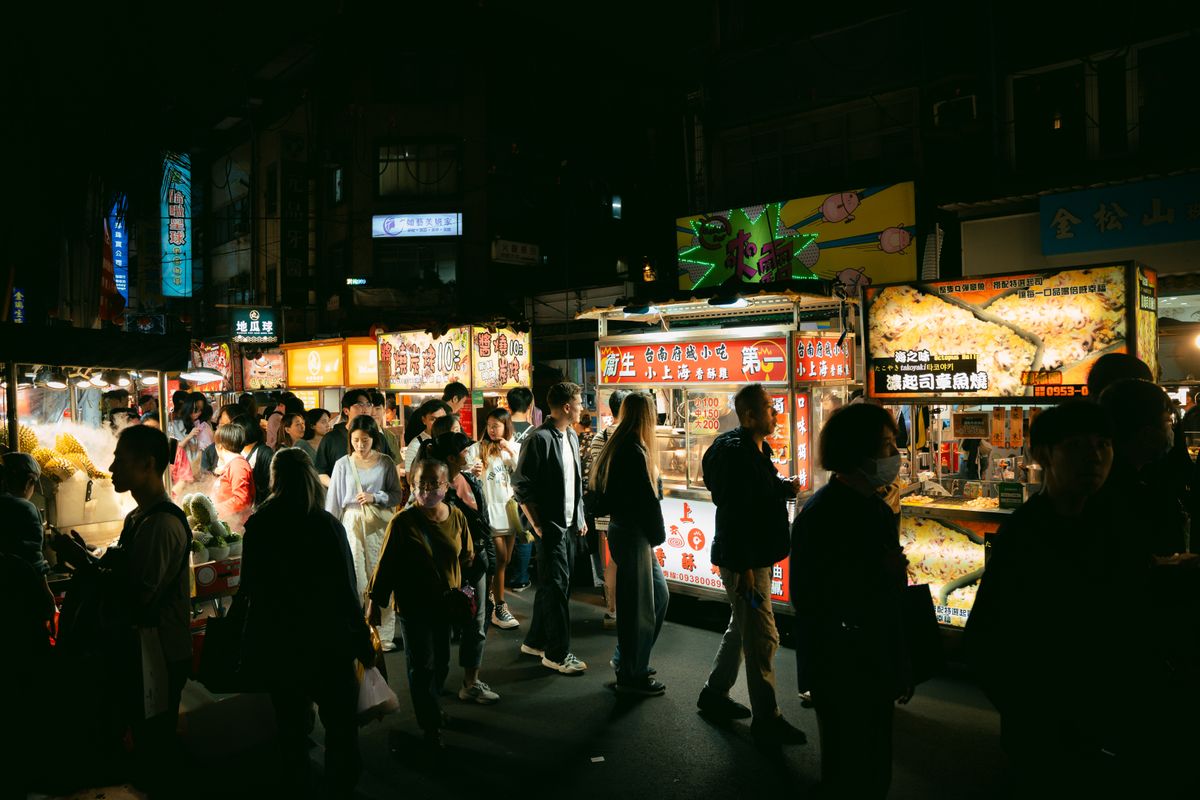Food stalls and crowds at Kenting Street night market, Taiwan
