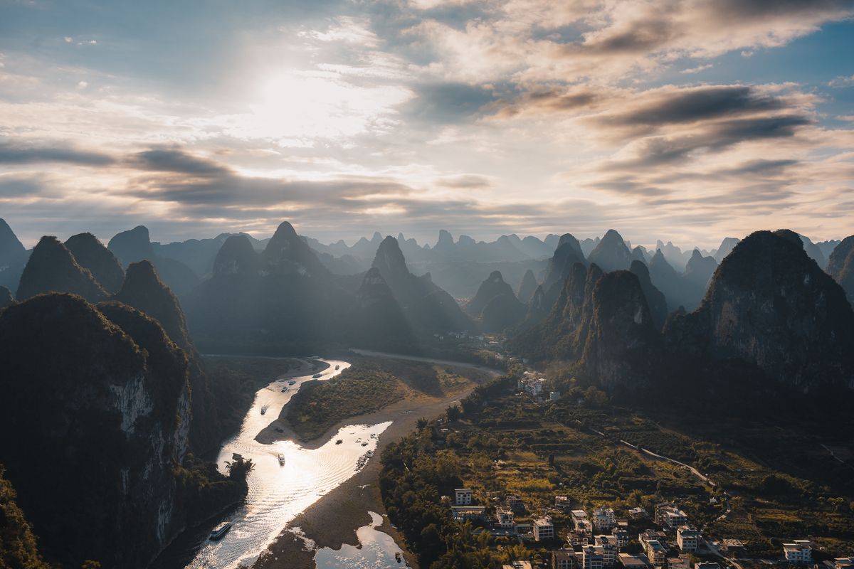 Karst limestone peaks along the Li River at sunset, Guangxi, China