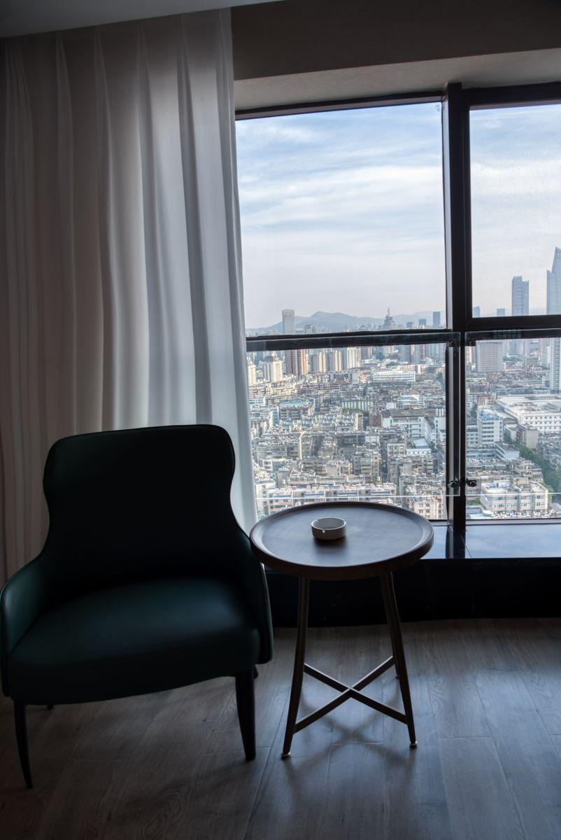 Hotel room with a city skyline view in Shanghai