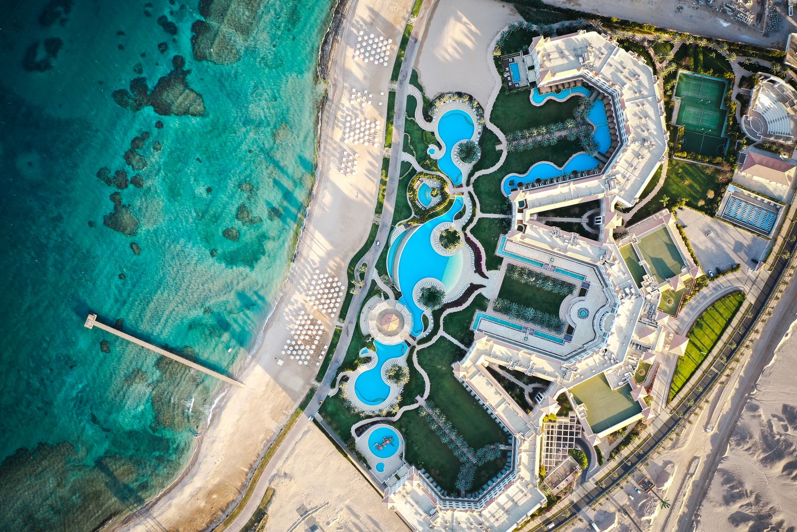 Aerial view of a beach resort with turquoise Red Sea water in Hurghada, Egypt